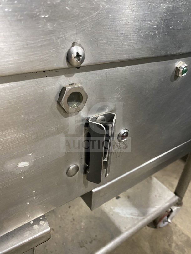 AccuTemp Accu-Steam stainless-steel gas flat-top griddle on a rolling stand, visible bolts and reset indicator, used condition.