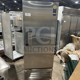 Everest stainless steel single door reach-in freezer, model EBF1, on casters, with poly-coated wire rack, gently used.