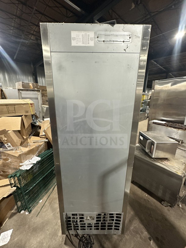 Everest EBF1 commercial stainless steel single door reach-in freezer, 115V, on casters, with poly coated wire rack.