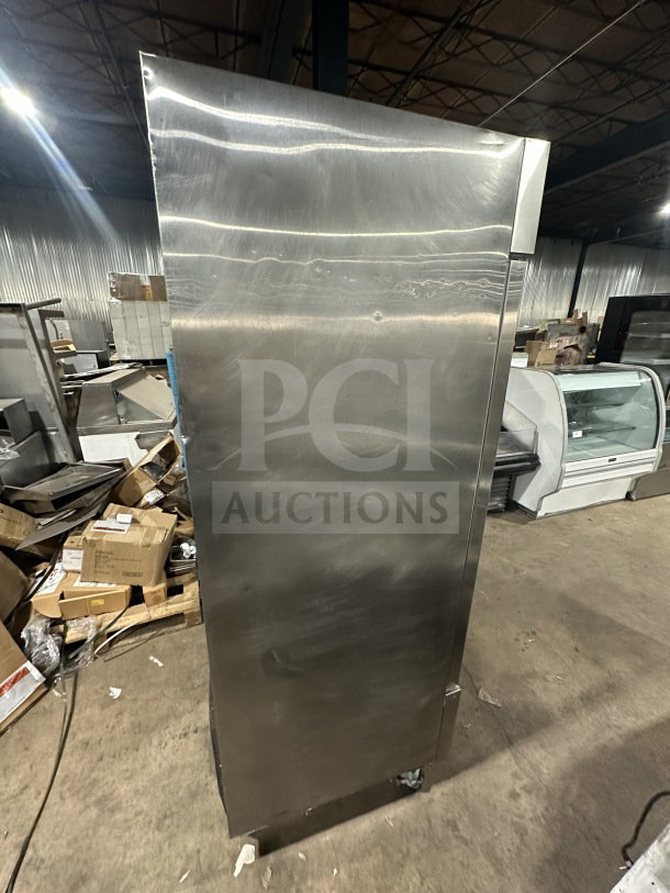 Universal Coolers RICI 30 commercial stainless steel single door reach-in cooler on casters, with coated wire rack.