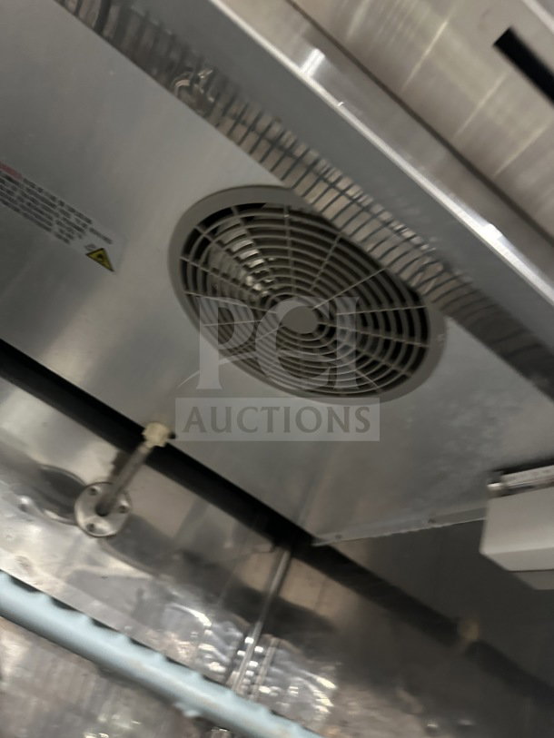 Universal Coolers RICI-30 refrigerator interior with fan and metal finish. Includes poly coated rack. Serial: 9117110089.