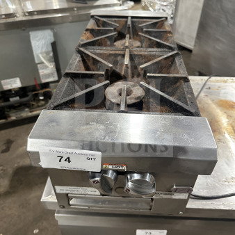 Southbend stainless steel 2-burner hotplate, model HDO-12, natural gas, on legs, visible wear, auction sticker present.