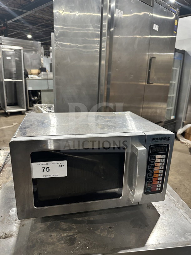 Solwave 180MW1000SS stainless steel countertop microwave, digital control, 2023 model, electric, on legs, SN: 230500807, 120V.