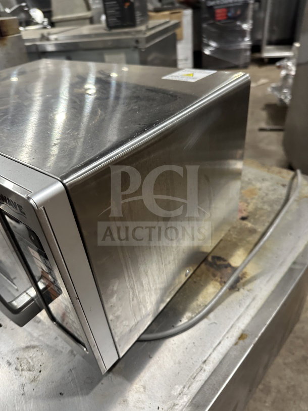 Solwave commercial stainless steel microwave, model 180MW1000SS. Features digital control, legs, minor wear.