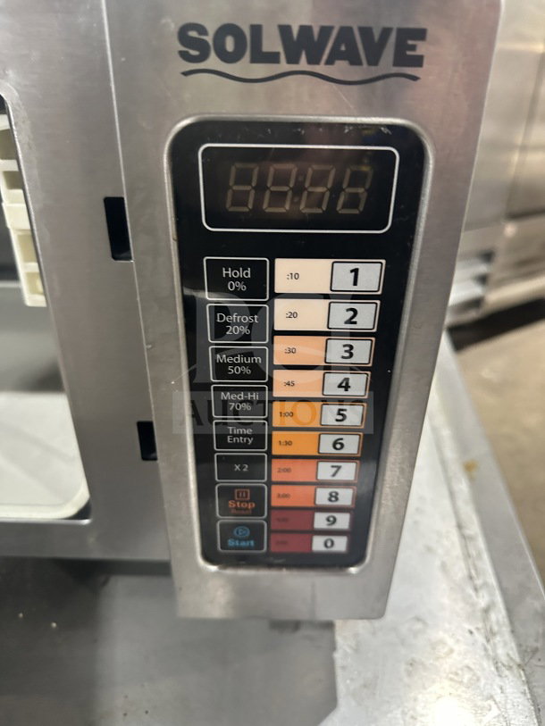 Solwave 180MW1000SS commercial stainless steel microwave with digital controls, model 2023, SN: 230500807, 120V, on legs.