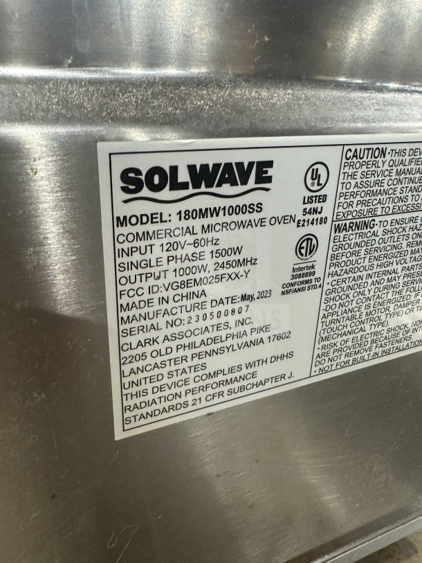 Solwave Model 180MW1000SS stainless steel commercial microwave, 1000W, digital control, 2023 model, UL certified label visible.