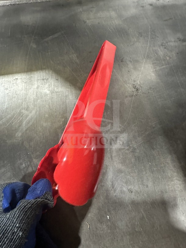 Brand new Cambro Lugano 12" red scallop grip tongs, model 12TGS404, commercial plastic, pristine condition.