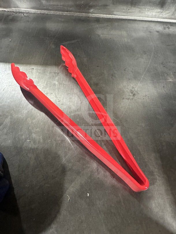 Cambro Lugano Series red 12" scallop grip tongs, Model 12TGS404, made of durable plastic, brand new condition.