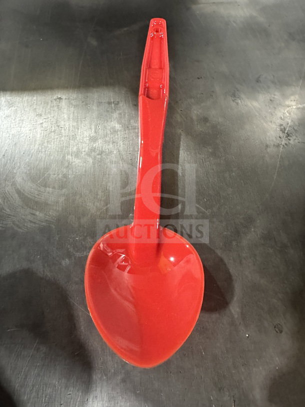 Brand new Camwear red plastic spoon, 13 inches, Model SPO13CW404, commercial grade, pristine condition.