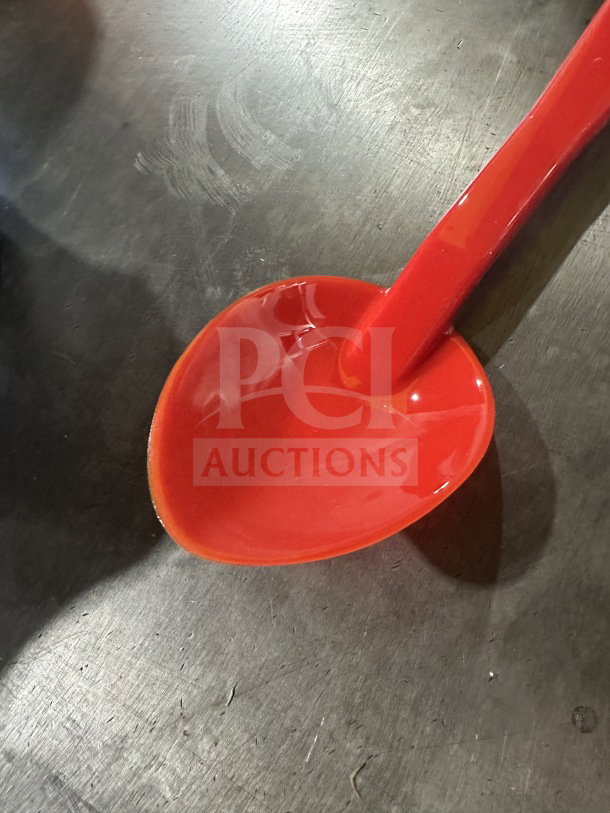 Camwear red plastic spoon, 13 inches, Model SPO13CW404, brand new. Commercial use, lot of 12 per box.