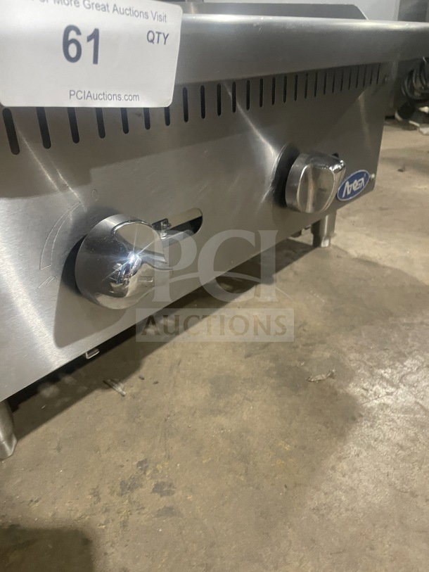 Atosa CookRite ATCB-24 stainless-steel countertop char-rock broiler, gas-powered, heavy-duty, model number visible.