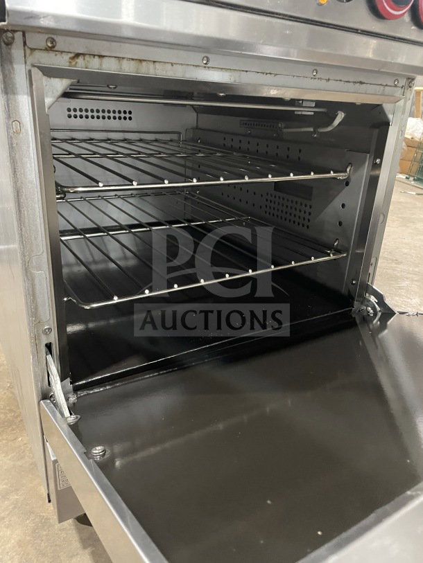 Cookline ER24-208 commercial stainless steel 4-burner range/oven, electric 208V, with backsplash and wired oven rack.