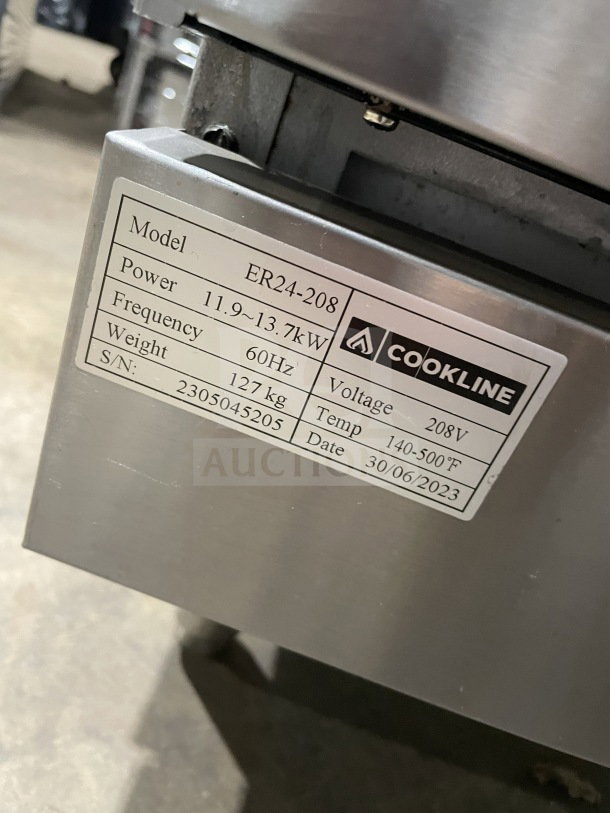 Cookline ER24-208 stainless steel electric 4-burner range/oven combo with backsplash, wired rack, serial 2305045205, 208V.
