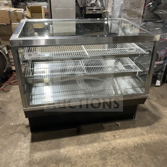 Commercial square glass refrigerated bakery/deli display case with poly coated wired racks, electrical powered, excellent condition.