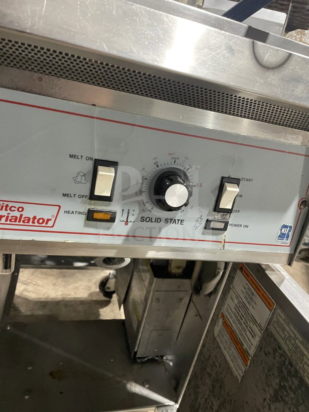 Pitco Frialator 2-vat electric fryer, model BBE145-CQ, stainless steel, with center dump station, control panel visible.