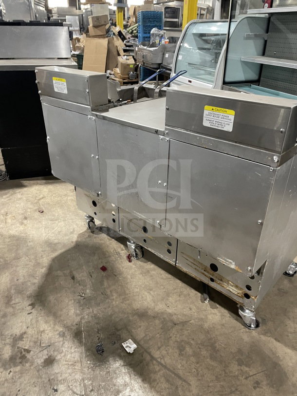 Pitco Frialator stainless steel electric 2-vat fryer, model BBE145-CQ, with center dump station and basket fryer.