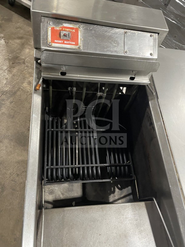 Pitco Frialator BBE145-CQ stainless steel electric 2-vat fryer with center dump station, basket, limit control reset button.