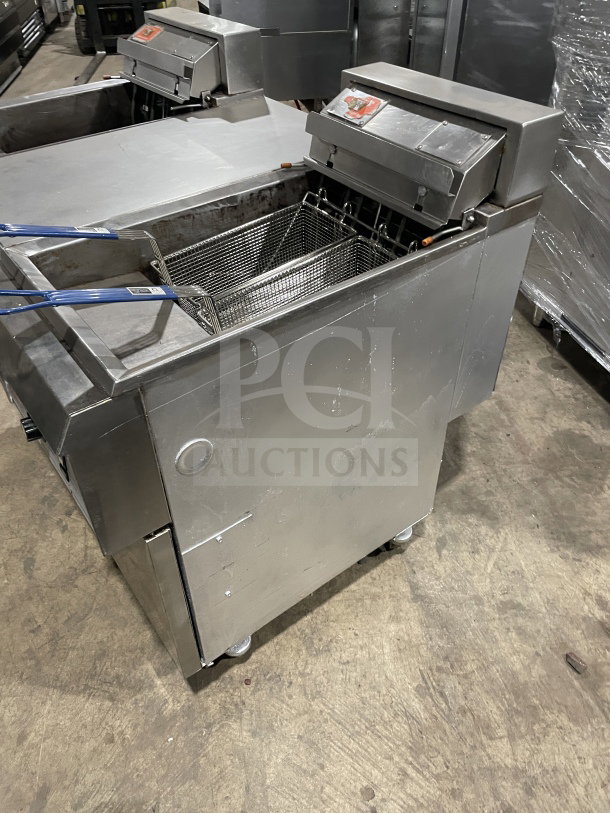 Pitco Frialator stainless steel electric fryer, model BBE145-CQ, with 2 vats, center dump station, and basket fryer.