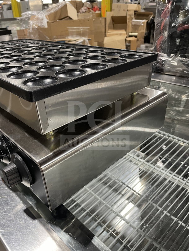 Commercial Electric 50-Hole Mini Pancake Maker, stainless steel, adjustable controls, excellent condition, durable design.