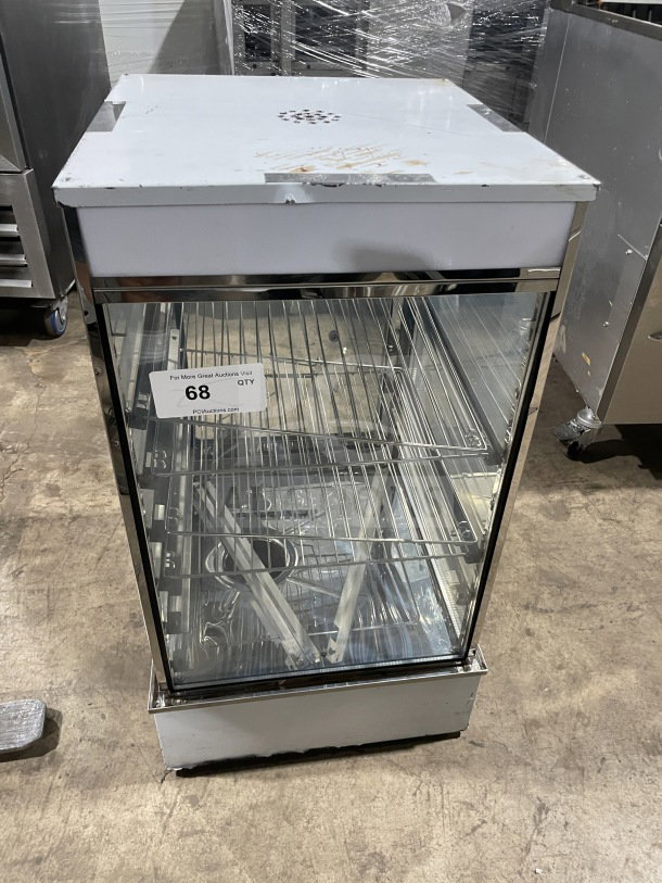 Commercial electric tabletop food steamer, model ESTC-16, with glass and chrome plated wire rack. Countertop design.