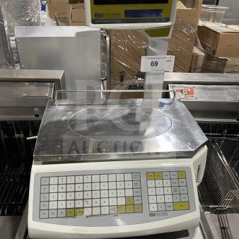 Easy Weigh LS-100 digital scale, commercial countertop model, serial LS01150443, 85/240V, with keypad and display.