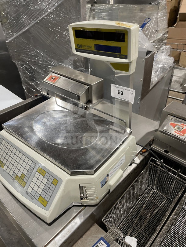 Easy Weigh LS-100 commercial digital scale, model LS-100 SN: LS01150443, 85/240V. Features keypad and digital display.