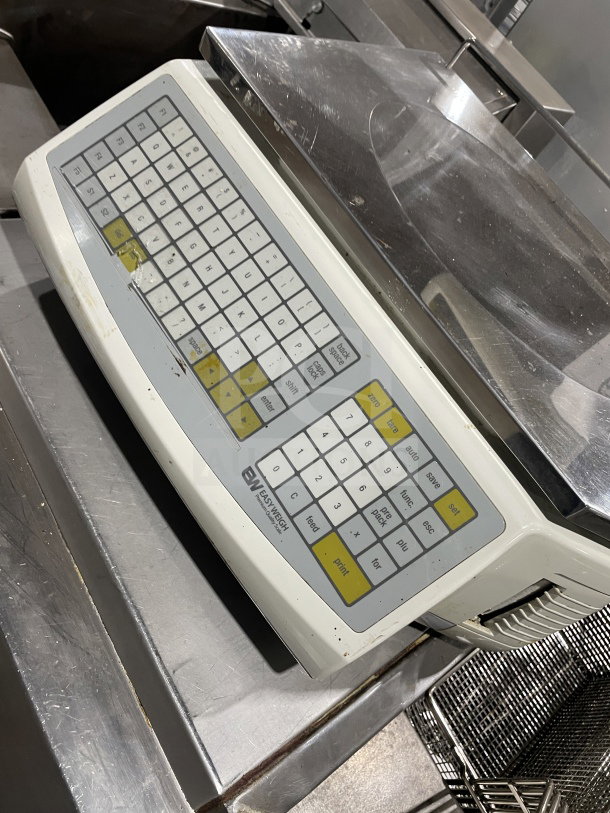 Easy Weigh LS-100 digital scale, commercial-grade, with keypad and display. Serial: LS01150443. Condition shows use.