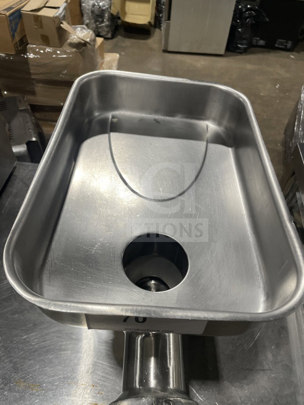 Skyfood SMG22F commercial meat grinder with a stainless steel tray, heavy-duty design, electric powered, in good condition.