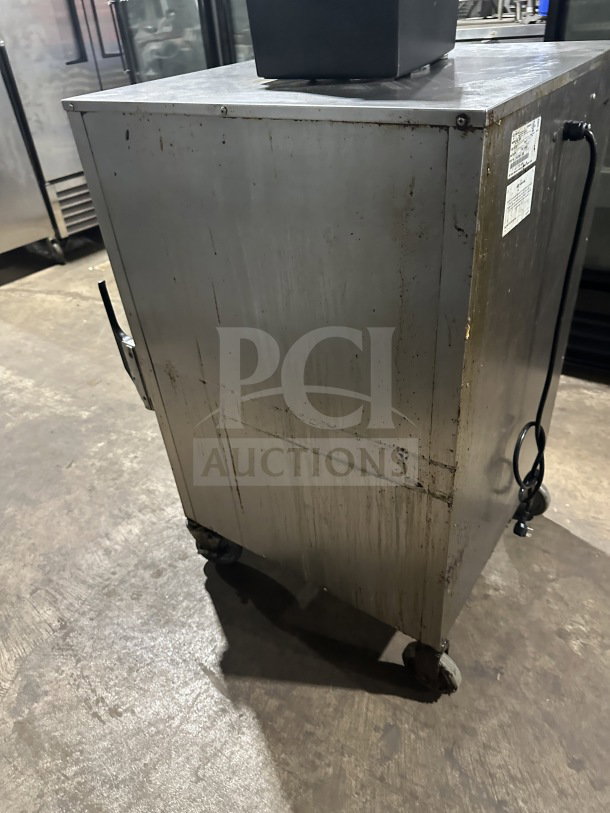 Alto Shaam Model 1200S stainless steel countertop holding cabinet on casters, electric-powered, SN M10673352021, 120V.