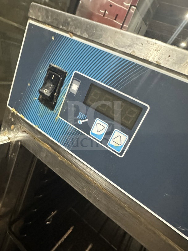 Alto Shaam 1200S stainless steel Halo Heat holding cabinet control panel, showing digital display and buttons.