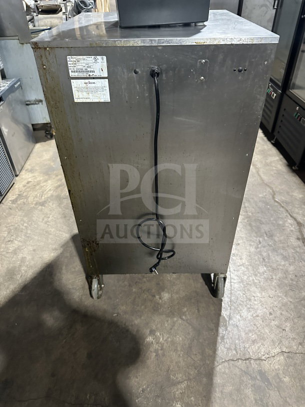 Alto Shaam 1200S stainless steel electric Halo Heat holding cabinet, 120V, on casters, visible label with model and SN.