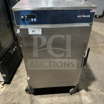 Alto Shaam 1200S stainless steel electric holding cabinet, model number 1200S, showing control panel and wheels, SN: M10673352021, 120V.