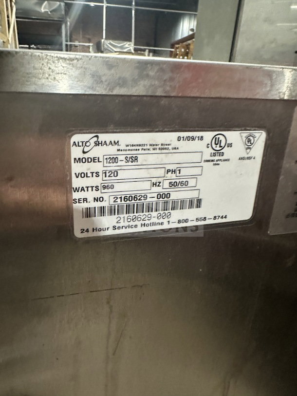 Alto Shaam 1200S stainless steel Halo Heat holding cabinet, electric, 120V, used, showing model and serial number label.