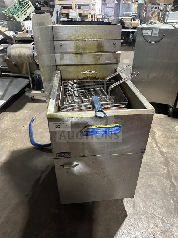 Pitco 65C+ commercial deep fat fryer, stainless steel, natural gas, with backsplash and frying basket, on casters.