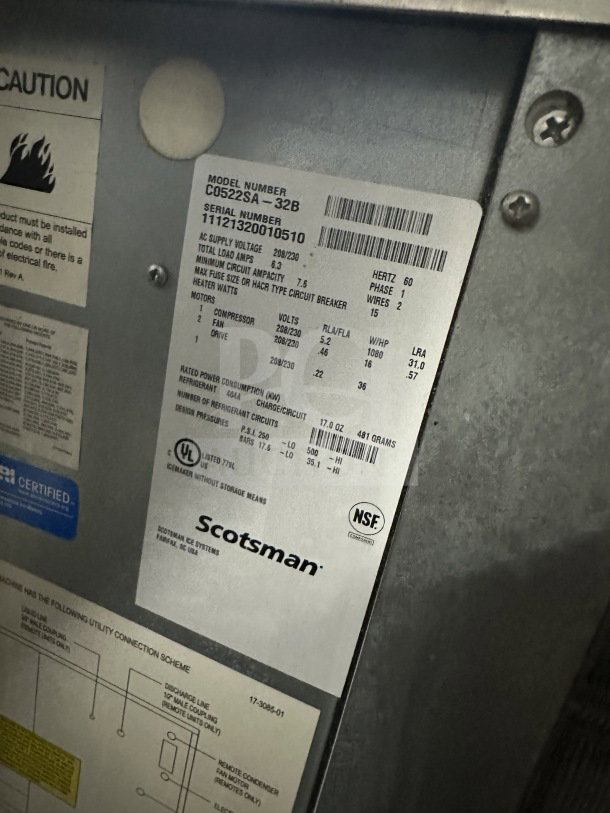 Scotsman Prodigy Plus Series Ice Machine, model C0522SA-32B, stainless steel, 22", commercial, tags showing specs and serial number.
