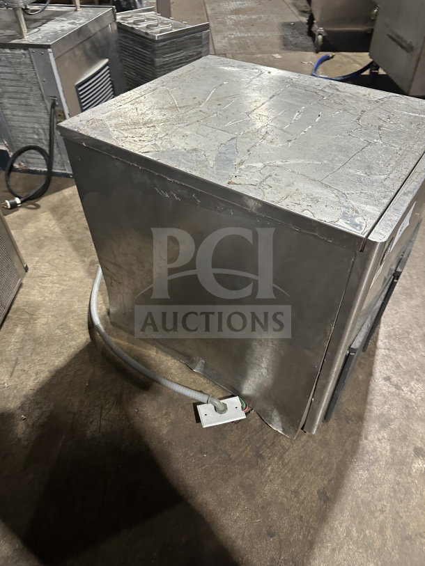 Hoshizaki commercial stainless steel modular ice machine head, electric powered, used condition, visible wire connection.