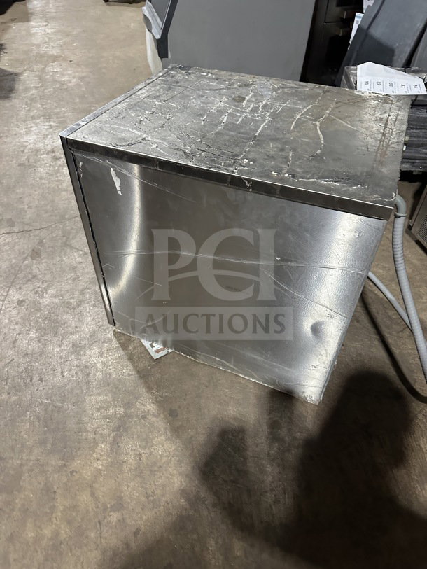 Hoshizaki commercial stainless steel modular ice machine head in used condition, visible surface scratches and signs of wear.
