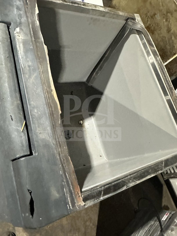 Scotsman B330P ice machine bin, air-cooled, electric-powered, visible wear on edges, 115V, on legs, commercial use.