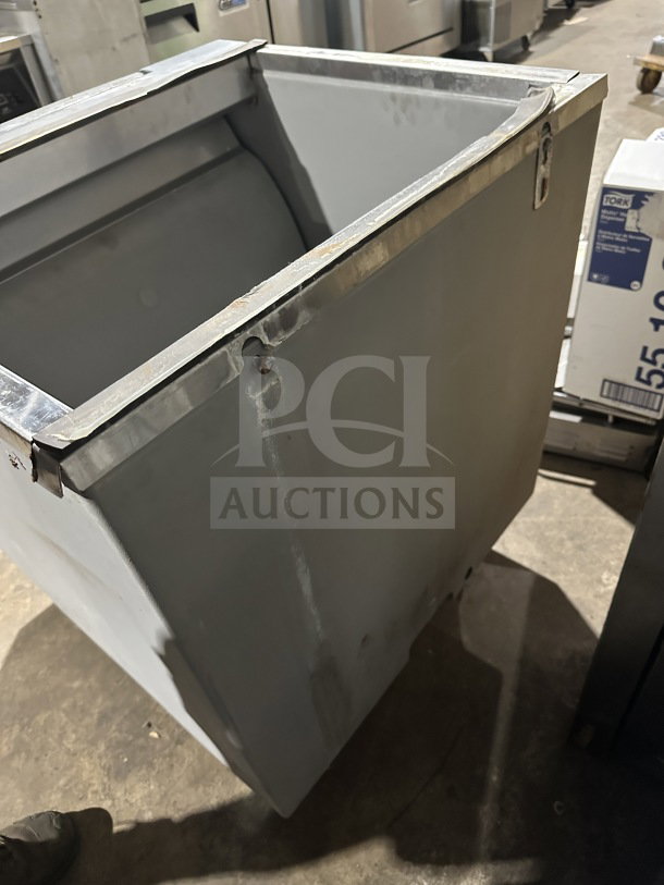 Scotsman B330P ice machine bin, air-cooled, electric, 115V, on legs. Used condition with minor wear visible.