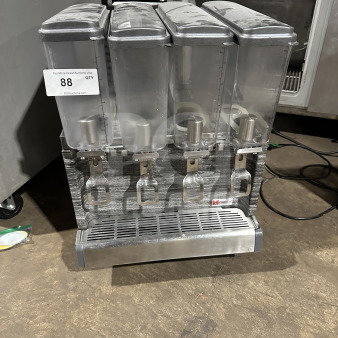 2019 Crathco CS4E countertop beverage dispenser, 4 clear poly hoppers, stainless steel body, on legs, Model CS4E/2D/3D16.