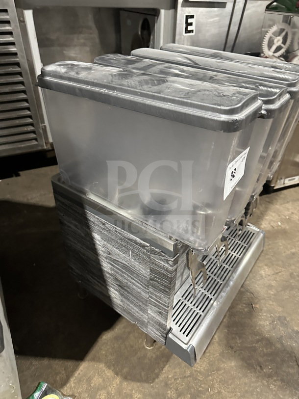 2019 Crathco CS4E/2D/3D16 beverage dispenser, 4 clear poly hoppers, stainless steel body, on legs, 120V, SN: T458048.