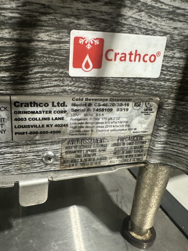 Crathco 2019 4-hopper beverage dispenser, stainless steel body, clear poly jugs, model CS4E/2D/3D16, 120V, SN: T458048.