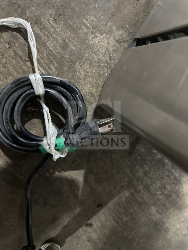 Power cord for 2019 Crathco CS4E/2D/3D16 beverage dispenser, stainless steel body, clear poly jugs, model number visible.