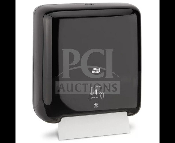 Tork Matic Series 302030 black hand towel dispenser, brand new, sleek design with instructions icon on front.