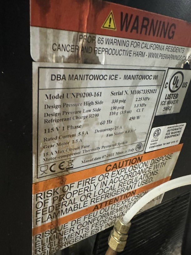 Manitowoc Stainless Steel 20" Undercounter Air-Cooled Nugget Ice Machine, Model UNP0200A-161, SN M10673352021, warning label visible.