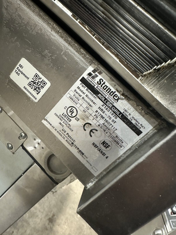 Standex APW Wyott HRS-755T stainless steel hot dog roller grill with visible model and serial number tags, 208/240V, 1 phase.