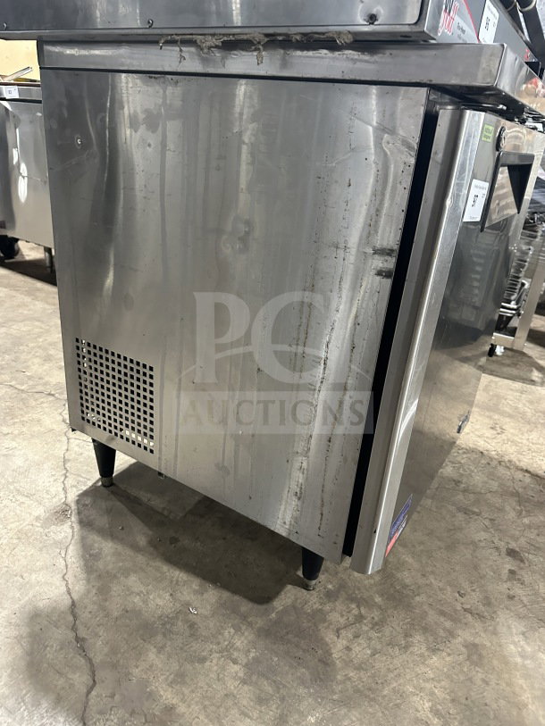 Turbo-Air MUR-28-N-711S stainless steel undercounter refrigerator with poly coated wire rack, 115V, on legs.