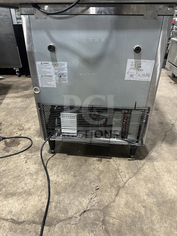 Turbo-Air stainless steel undercounter refrigerator, model MUR-28-N-711S, with poly-coated wire rack, SN H2MU2R0G63826. 115V, on legs.