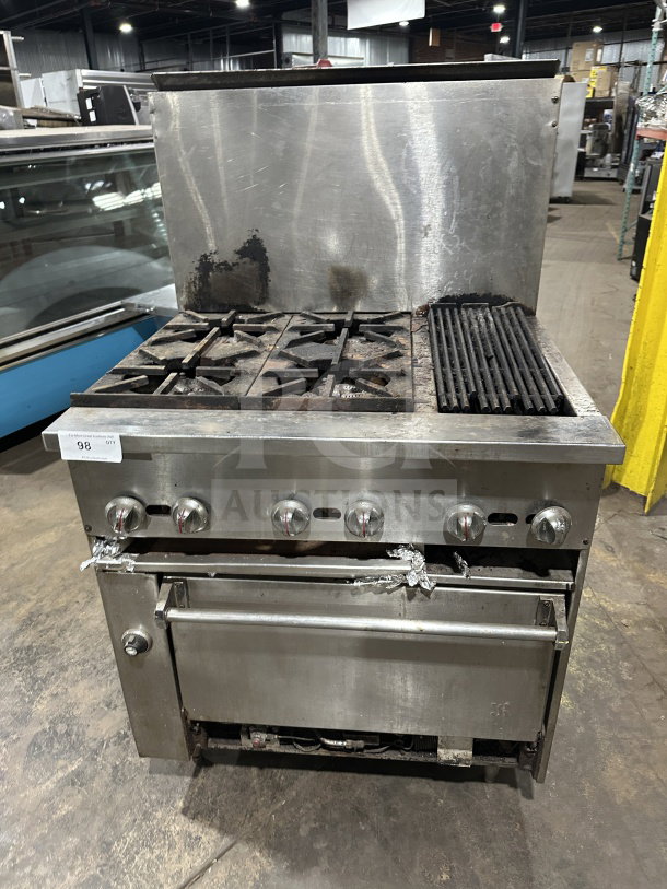 Commercial stainless steel gas range with 4 burners, 12" charbroiler, and standard oven base. Includes wired oven rack, on legs.