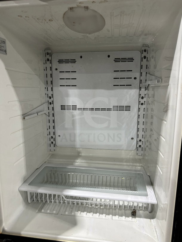 KitchenAid KURS24LSB03 commercial stainless-steel single door refrigerator interior, model SN EK14900234, 115V. Clean and spacious.
